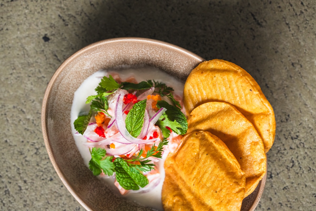 - DiningOut The ceviche at Lucina, served with tostadas. | Photo by Casey Wilson