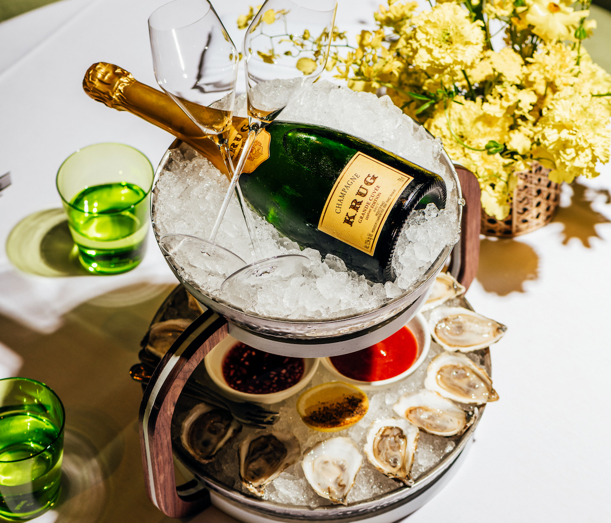 The Marigold Club’s “Get Chuffed” oyster presentation pairs a dozen bivalves with a bottle of Krug Grande Cuvee champagne. Photo by Arturo Olmos