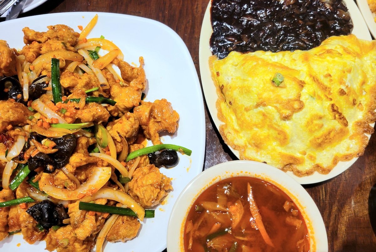 Rare2024Previews-9 - DiningOut The jajang rice (right) features a classic savory black bean sauce. | Photo by Linnea Covington