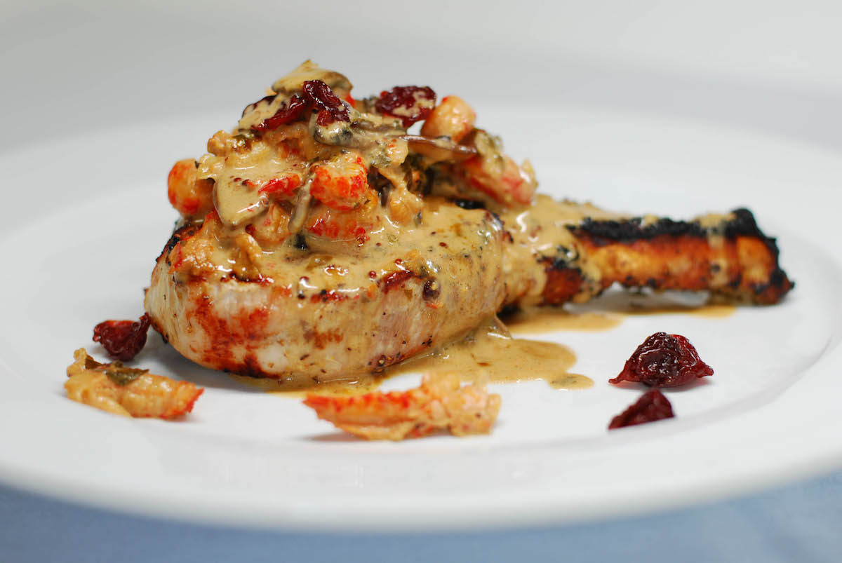 Pork chop with cognac and sour cherries at Gorji. | Photo by Gorji