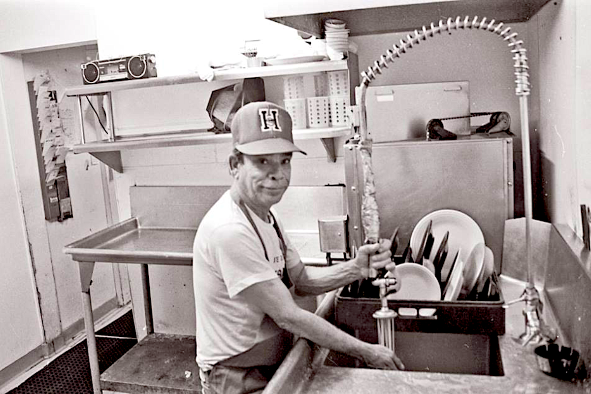 - DiningOut Felipe Mercado washing dished at the Rio Grande. | Photo Courtesy Rio Grande