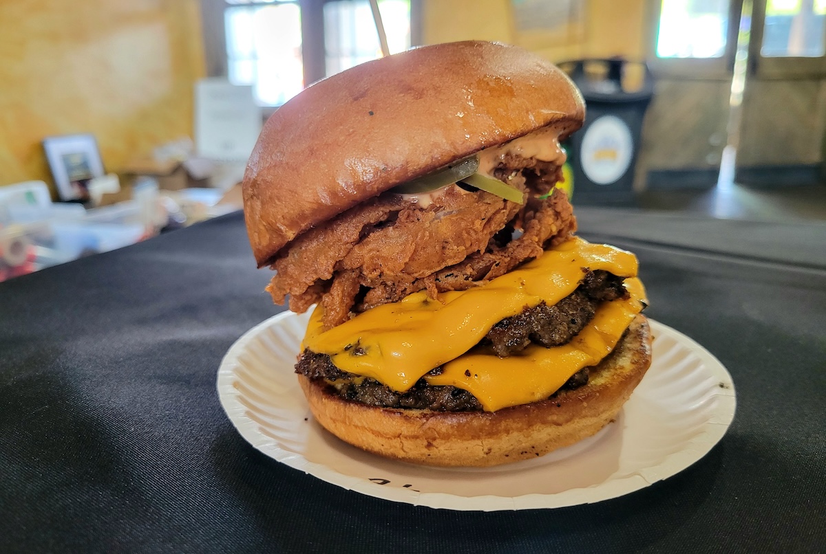 Bar-with-Sliding-Door-Showing-Cocktail-Area - DiningOut R!ot's burger made a quiet the scene in the tastiest way. | Photo by Linnea Covington
