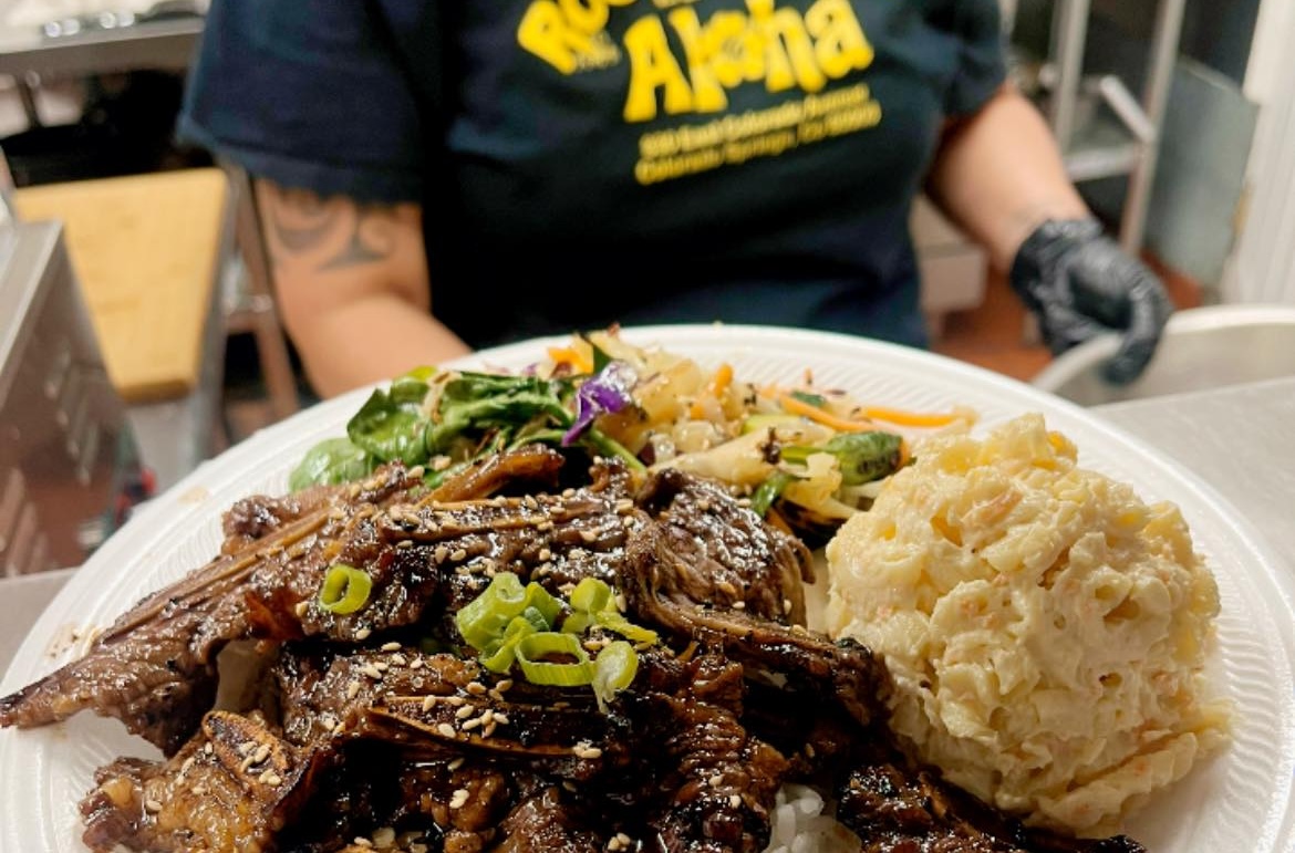 A spread of island favorites that truly satisfies the soul. | Photo by Roots Cafe
