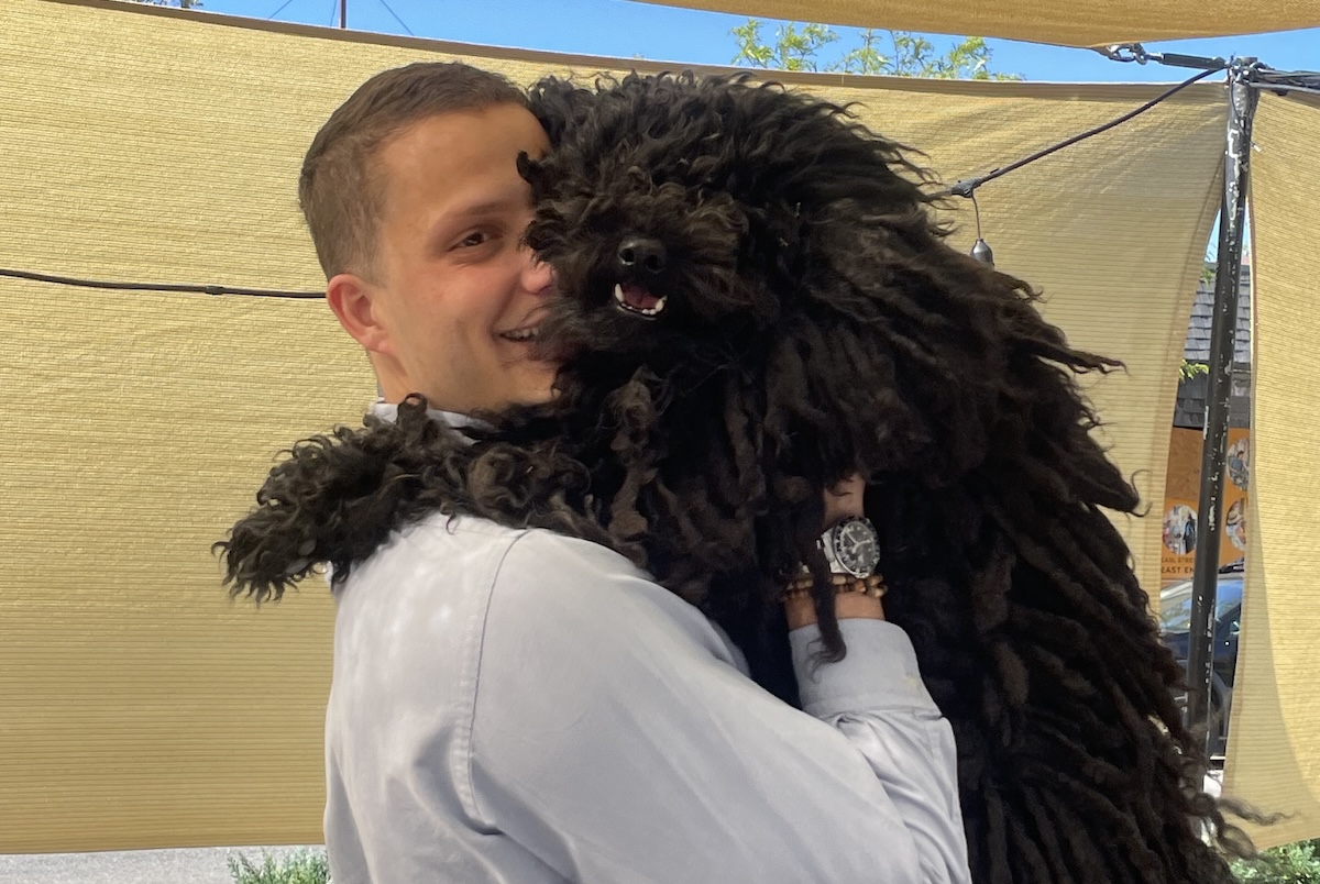 Ben-Zion Yaakoby of Pizzeria Alberico with his furry friend. | Photo courtesy of Ben-Zion Yaakoby