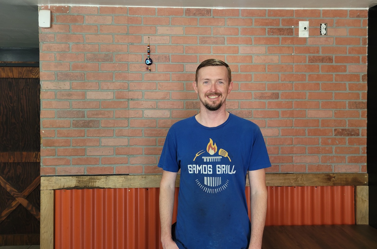 Samos Grill owner Vladimir Demin at his new brick and mortar spot in Aurora. | Photo by Linnea Covington