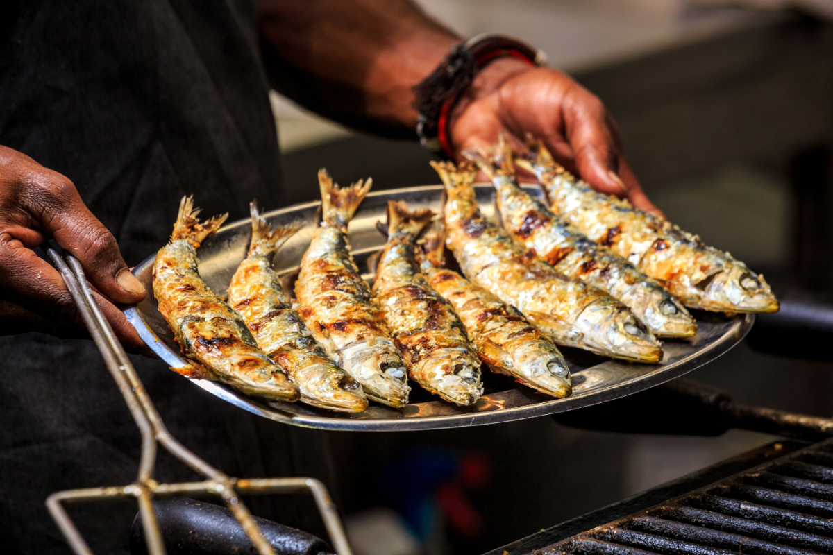 - DiningOut Freshly grilled sardines on a silver plate