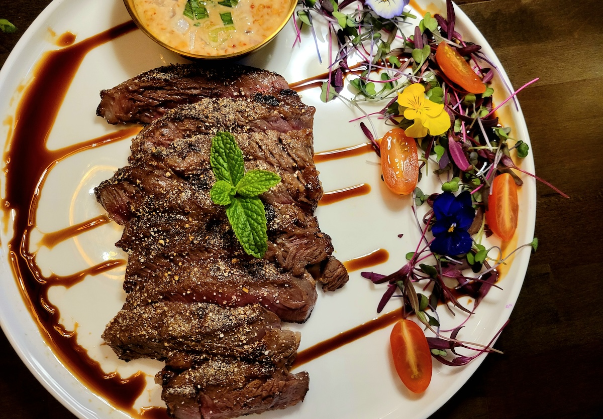 The Som Dee Steak is a true delight for any carnivore. | Photo by Linnea Covington