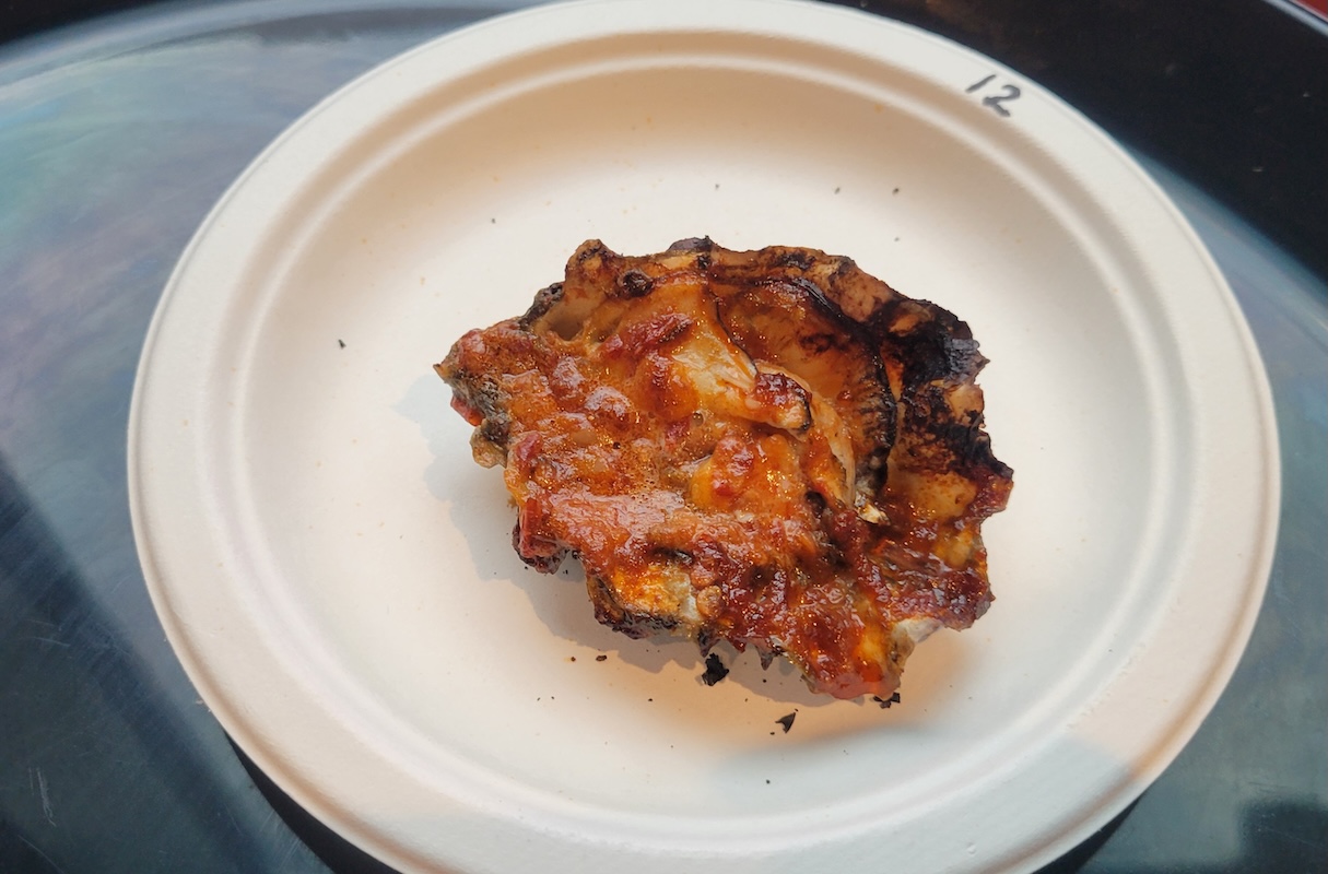 Chipotle-bourbon oyster chargrilled by Angelo's Taverna. | Photo by Linnea Covington