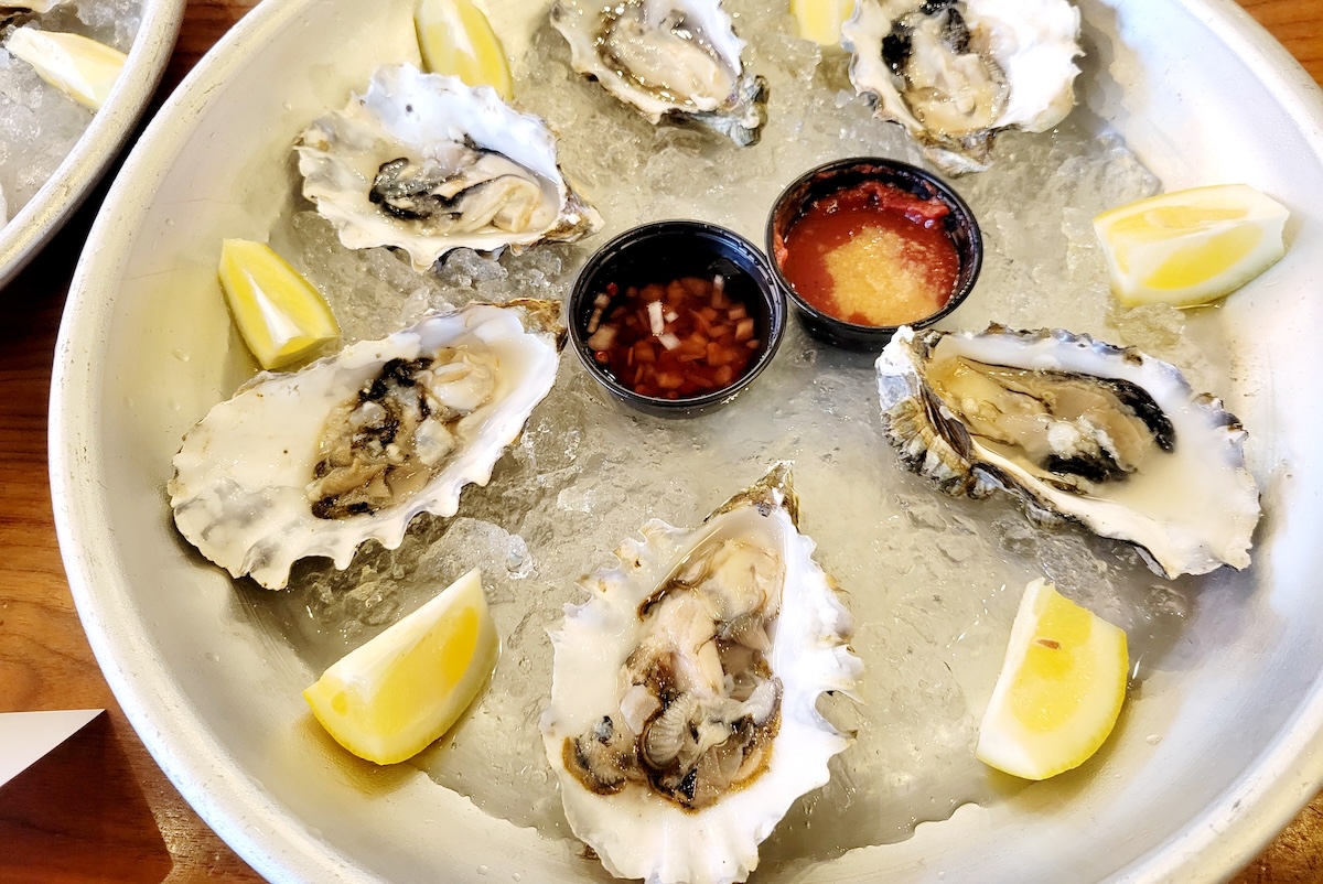 Get everything from oysters to wings to cocktails at Denver Central Market. | Photo by Linnea Covington
