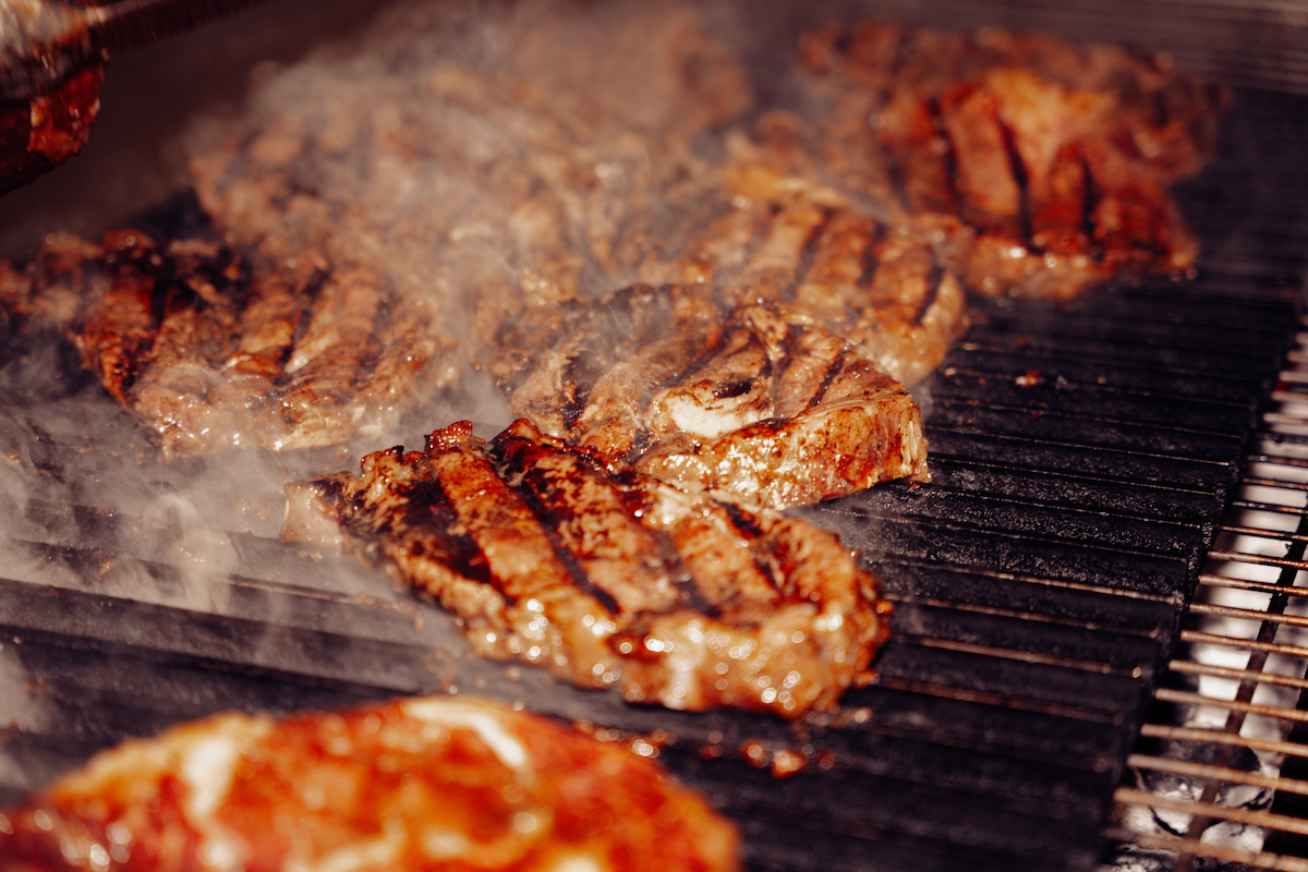 - DiningOut Attendees witnessed chefs grilling steaks on site at Rare. | Photo by Swizzle Media