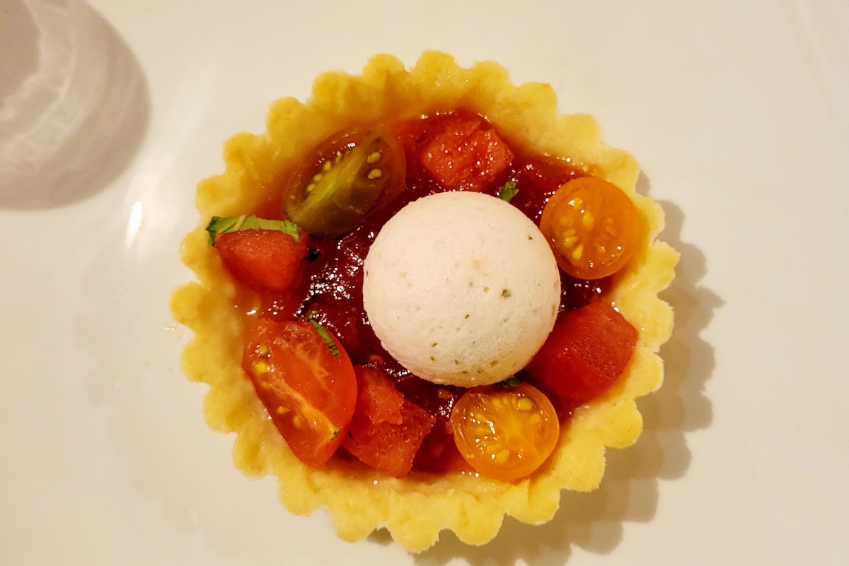 white table with tomato tart