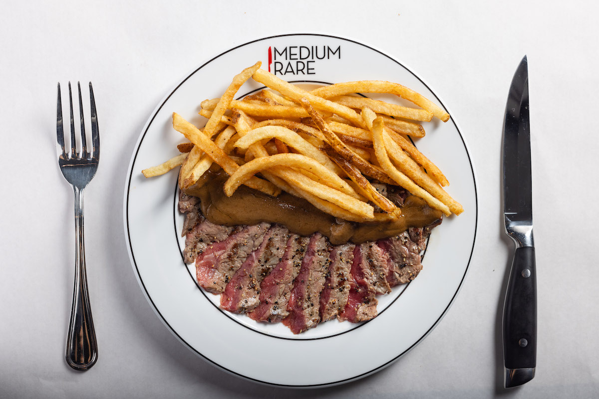 Steak and fries at Medium Rare. | Photo by Alex Staniloff