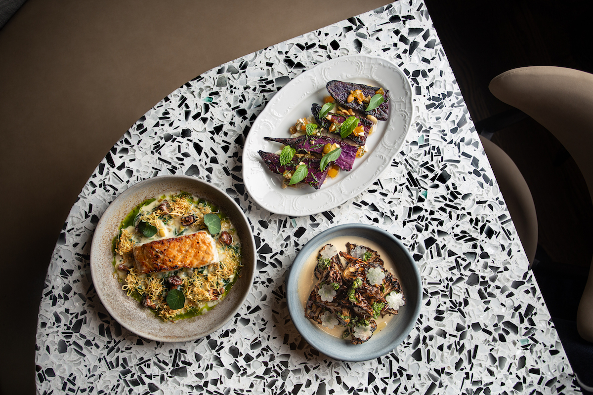 Fish and vegetable dishes, kissed by fire at Meridian. | Photo by Dan Padgett