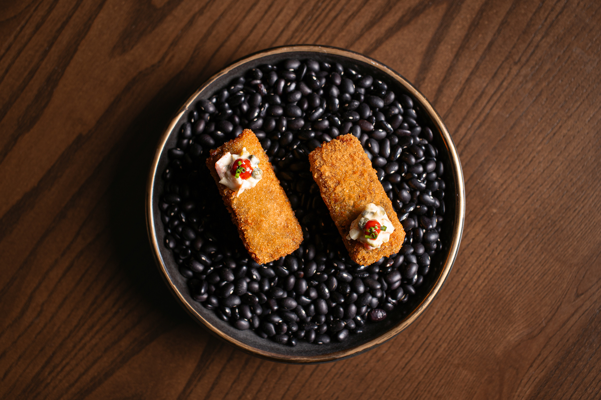Ham hock croquettes on the happy hour menu at Meridian. | Photo by Dan Padgett