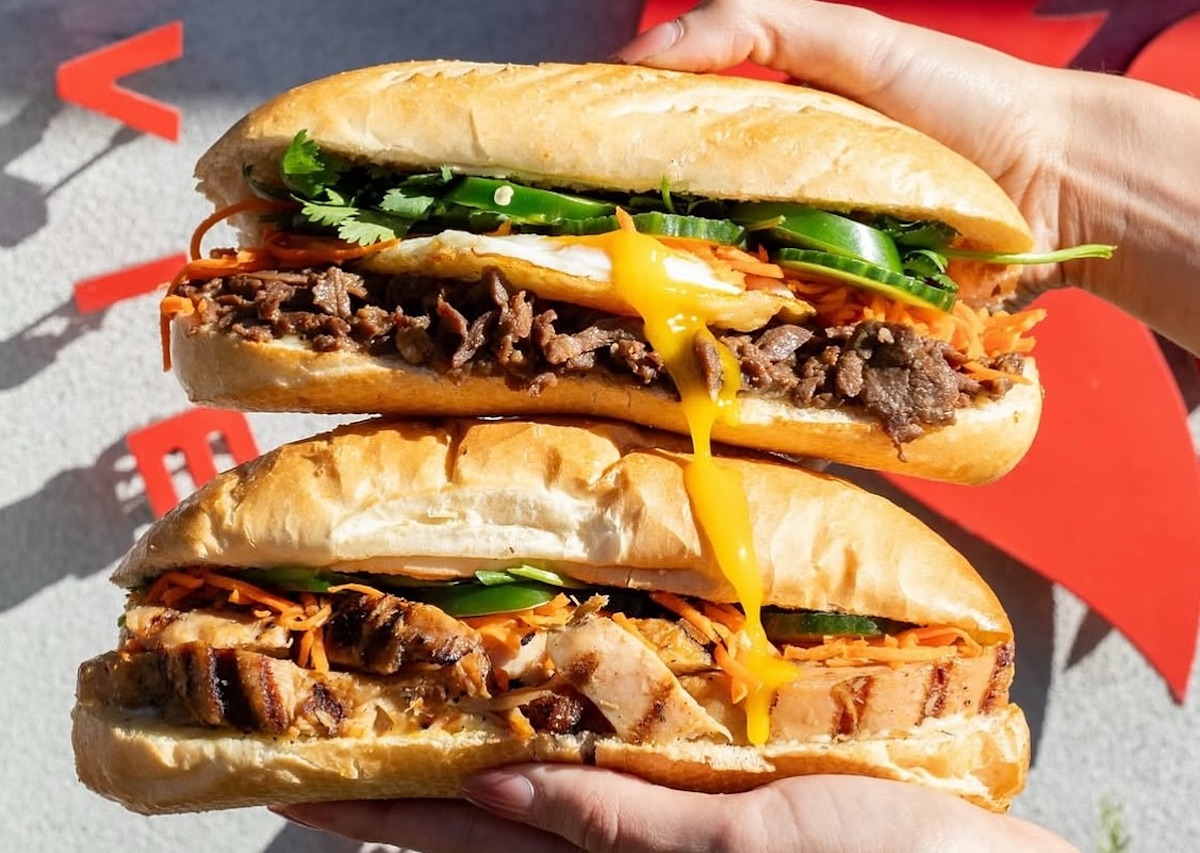 Beef and chicken banh mi with an egg yolk drip at Roostar Vietnamese Grill. | Photo by Roostar Vietnamese Grill