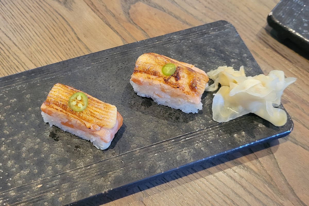 Don't miss the Salmon Oshizushi at Tamaki Den. | Photo by Linnea Covington