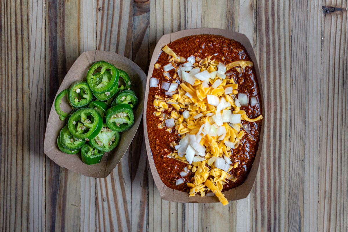Texas red chili with a side of fresh jalapenos at the Pit Room. | Photo by Jenn Duncan