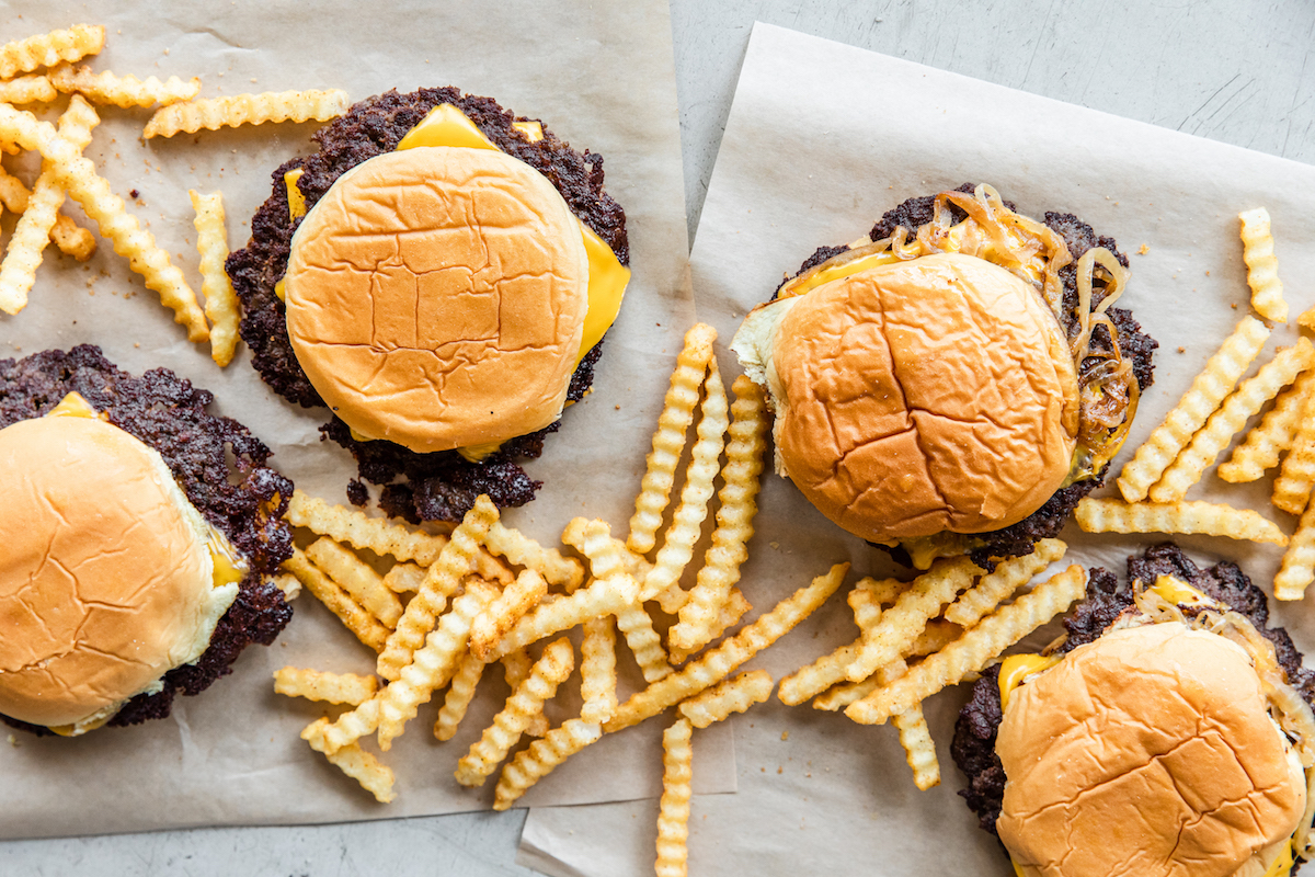 Smashburgers and crinkle cut fries at Trill Burgers. | Photo by Becca Wright