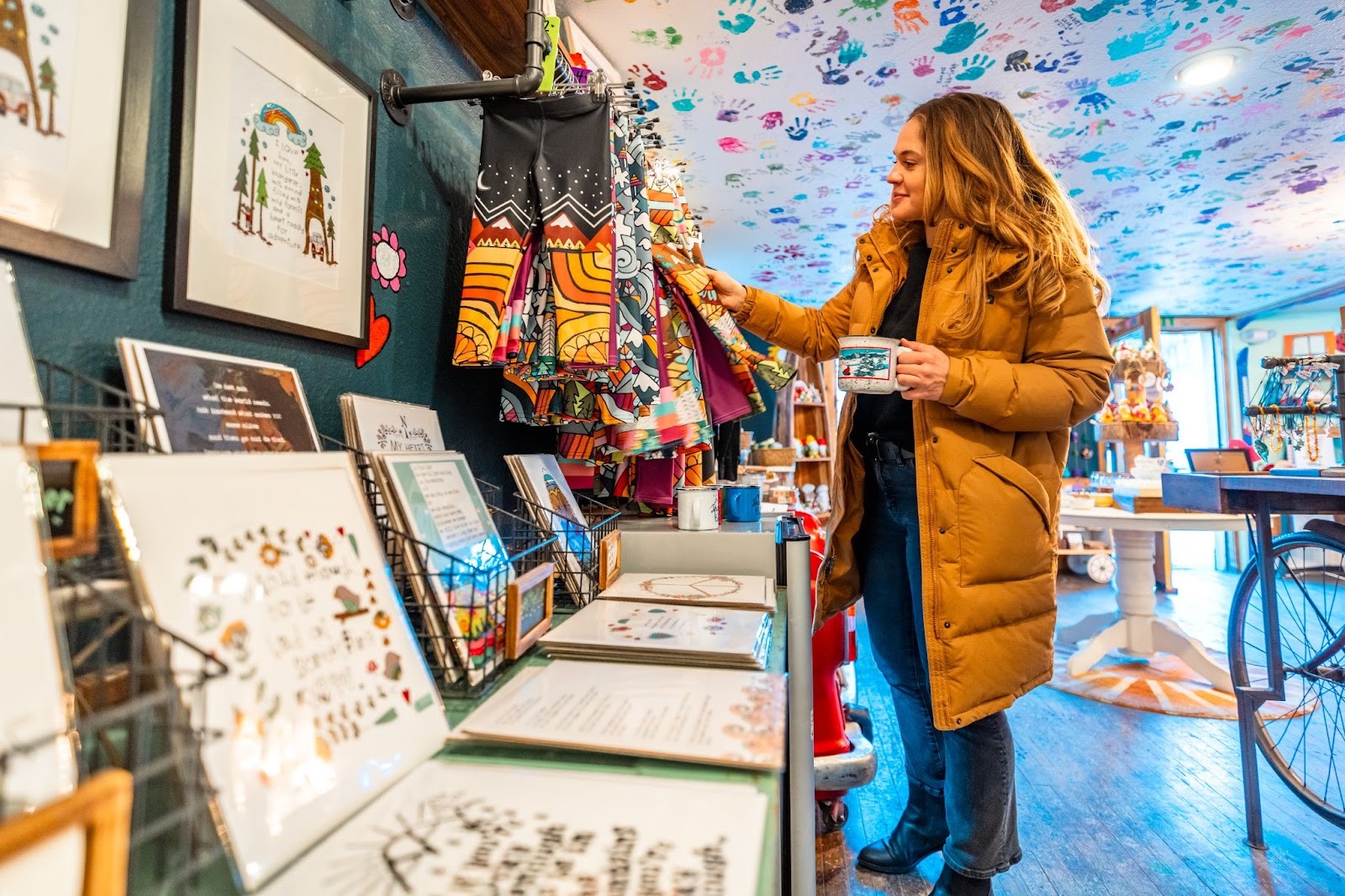 Local artist Erin McCrea designed this year’s commemorative mug | Photo by Curtis DeVore