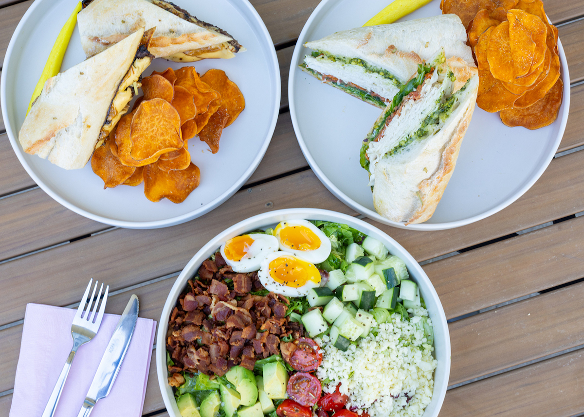 A spread of savory lunch dishes at Cafe Olivia. | Photo by Hidden Friends