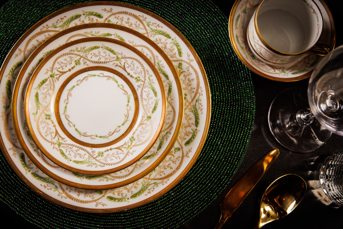 Gold-painted Ginori china at La Stella. | Photo by La Stella