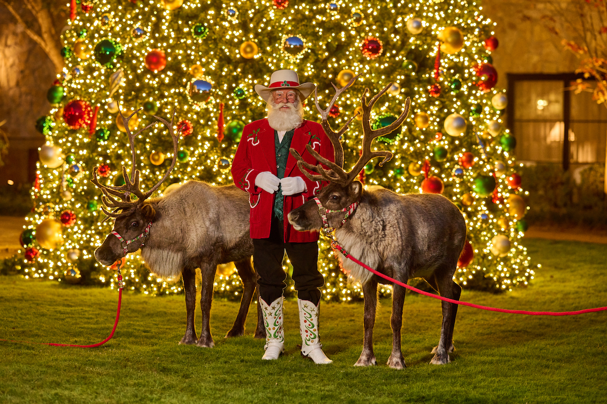 Cowboy Santa poses with his reindeer at Fort Worth Stockyards. | Photo by Fort Worth Stockyards