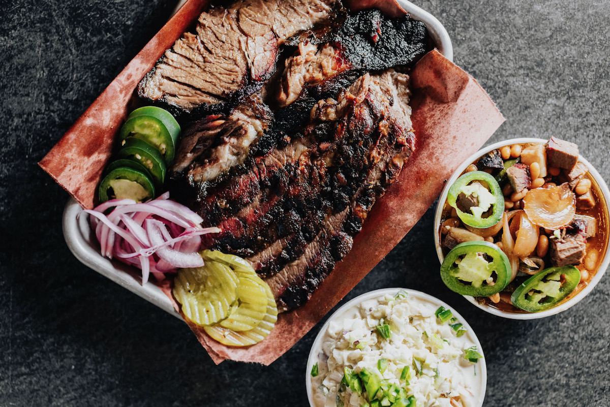 A hefty barbecue platter at Lockhart Smokehouse. | Photo by Kathy Tran