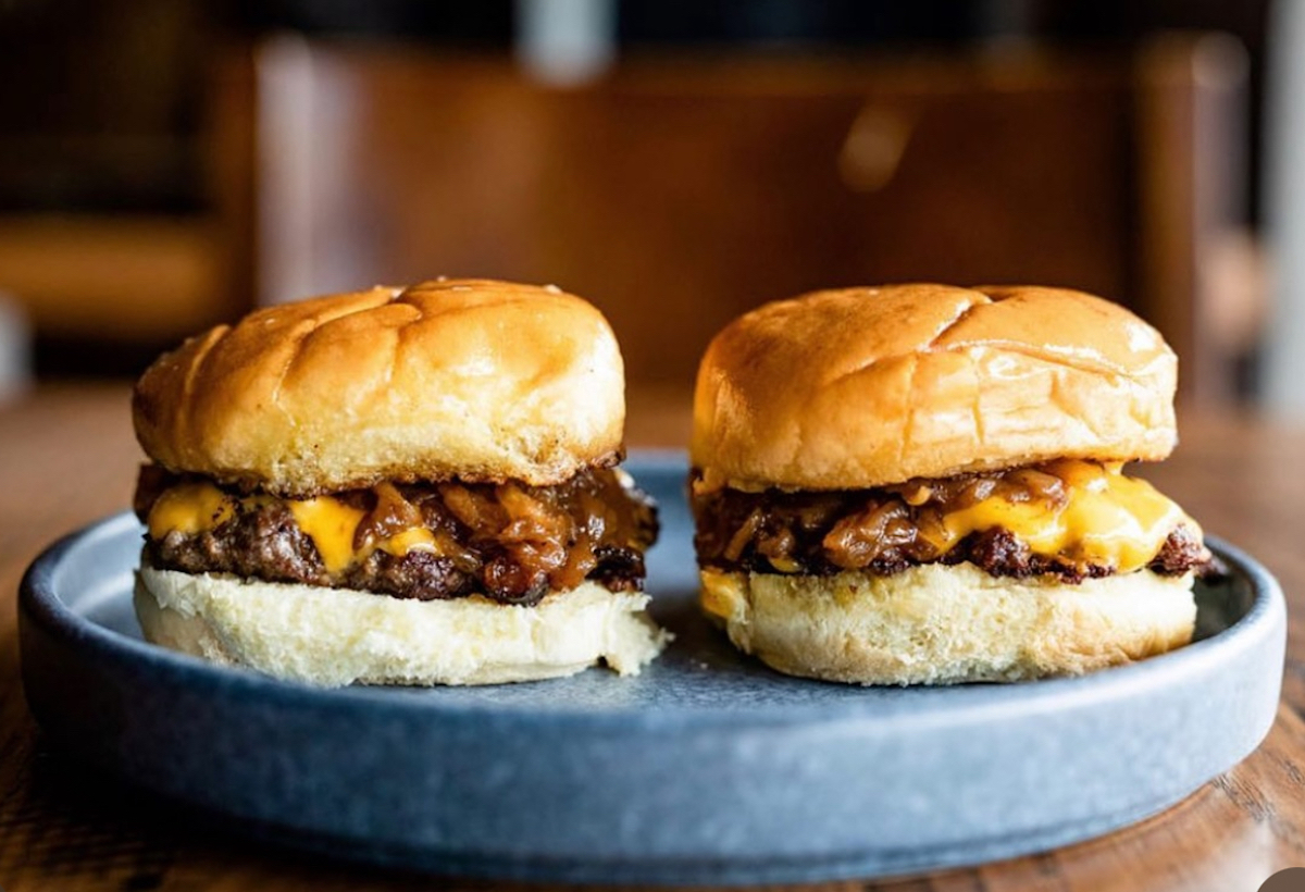 A pair of butter burgers at Riel, now shuttered. | Photo by Riel