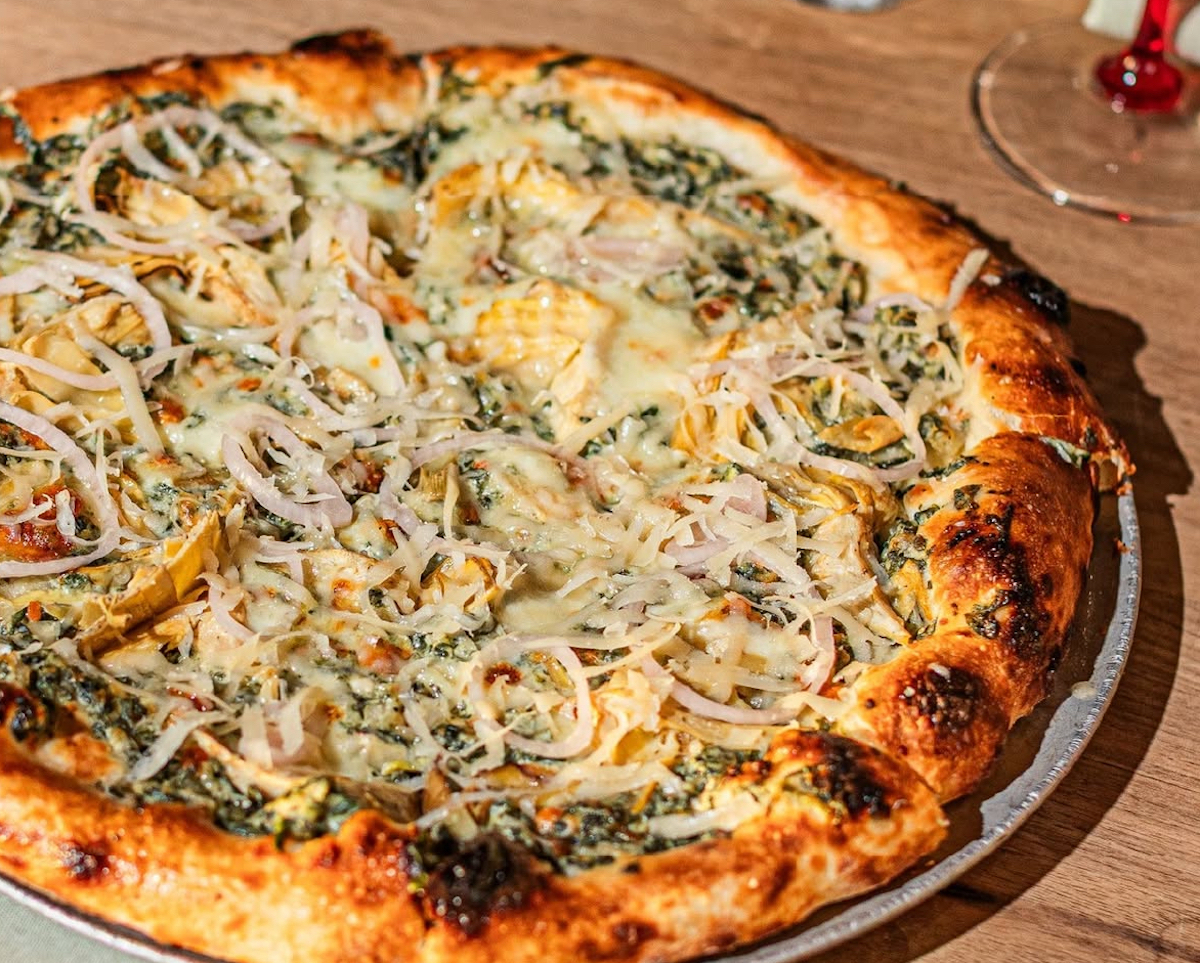 The spinach artichoke dip pizza at Rosie Cannonball. | Photo by Rosie Cannonball