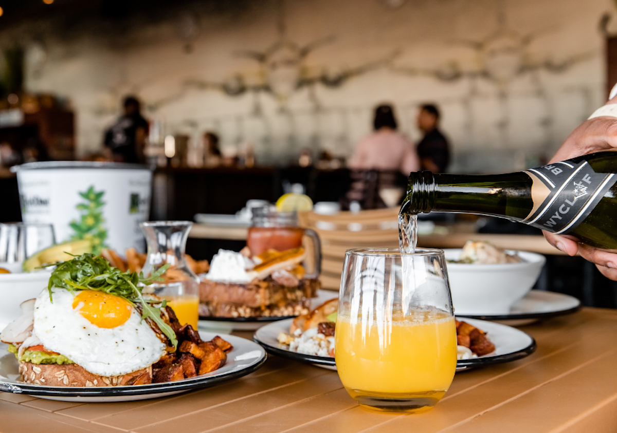 Smoked turkey avocado toast and mimosas at Maple Landing. | Photo by Maple Landing