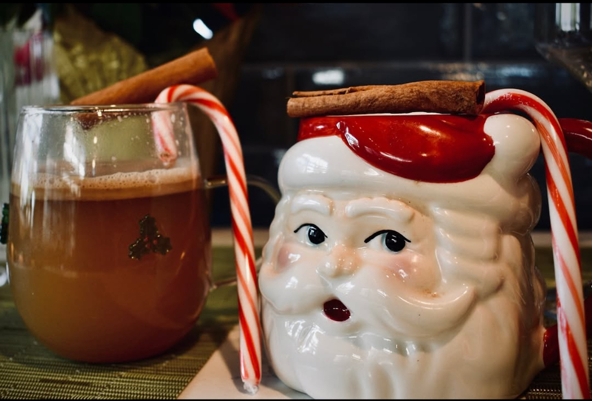 Hot buttered rum in Santa mugs at Succulent. | Photo by Shawn Virene