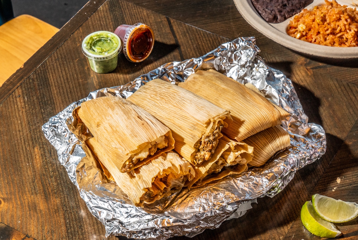 A half dozen pork tamales at Tacos A Go Go. | Photo by Tacos A Go Go