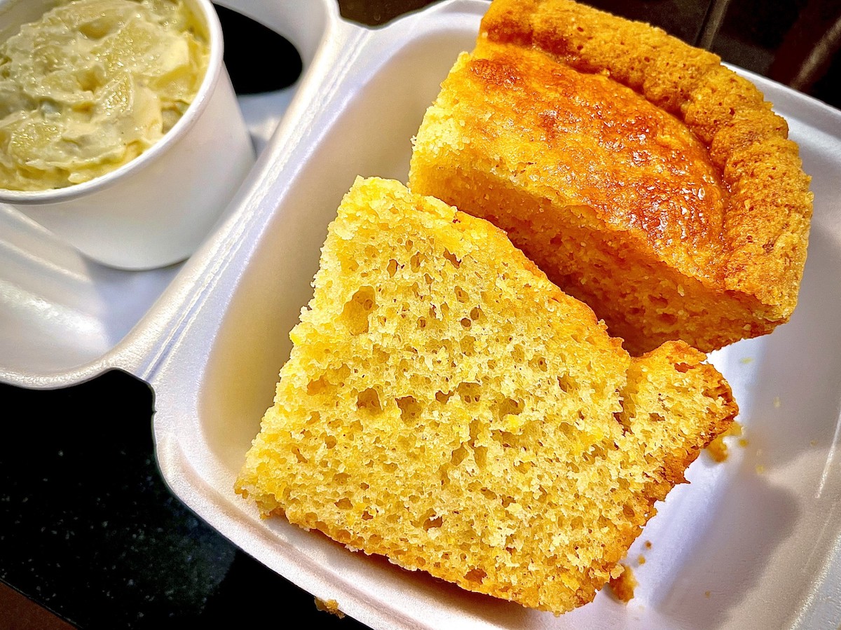Perfect slices of sweet cornbread are available as a side dish at the Brisket House. | Photo by Greg Morago