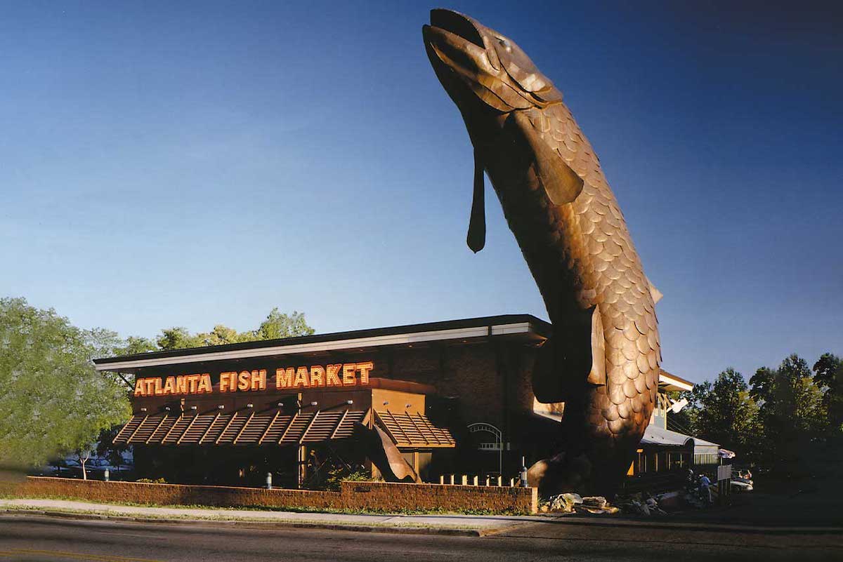 The 65-foot bronze statue that greets guests at the Atlanta Fish Market. | Photo by Atlanta Fish Market