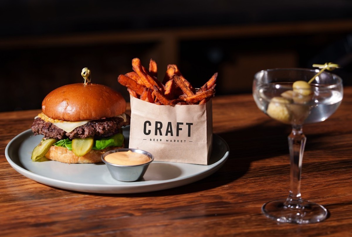 Cheeseburger, fries, and a martini at Craft Restaurant & Beer Market. | Photo by Craft Restaurant & Beer Market
