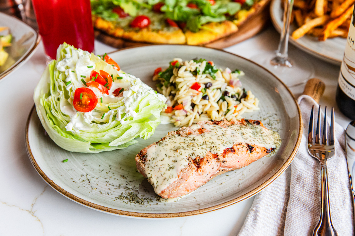The grilled salmon iceberg wedge with orzo pasta salad. | Photo by Hungry's