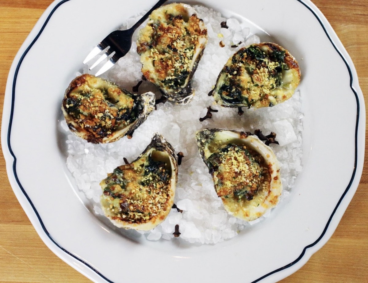 Grilled oysters at TJ’s Seafood Market. | Photo by TJ’s Seafood Market