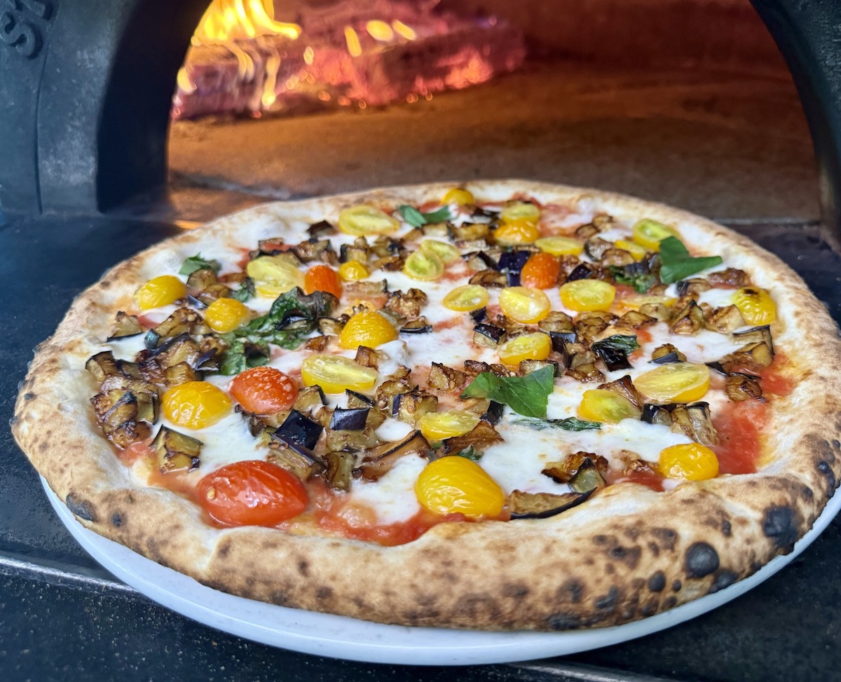 Eggplant and tomato pie on special, fresh out of the oven at Varuni Napoli. | Photo by Varuni Napoli