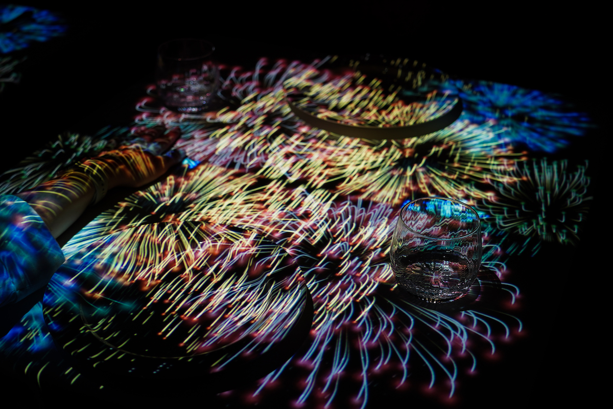 Fireworks are projected on the table at the  Le Petit Chef & Friends dining experience at Safina. | Photo by Intercontinental Houston