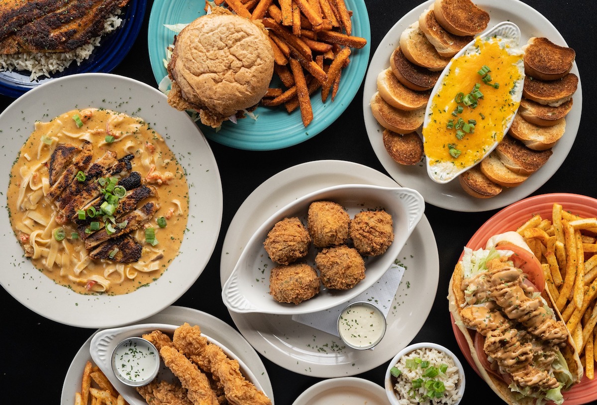 An assortment of fried dishes, bowls, and handhelds at the Free Man Cajun Café and Lounge. | Photo by the Free Man Cajun Café and Lounge