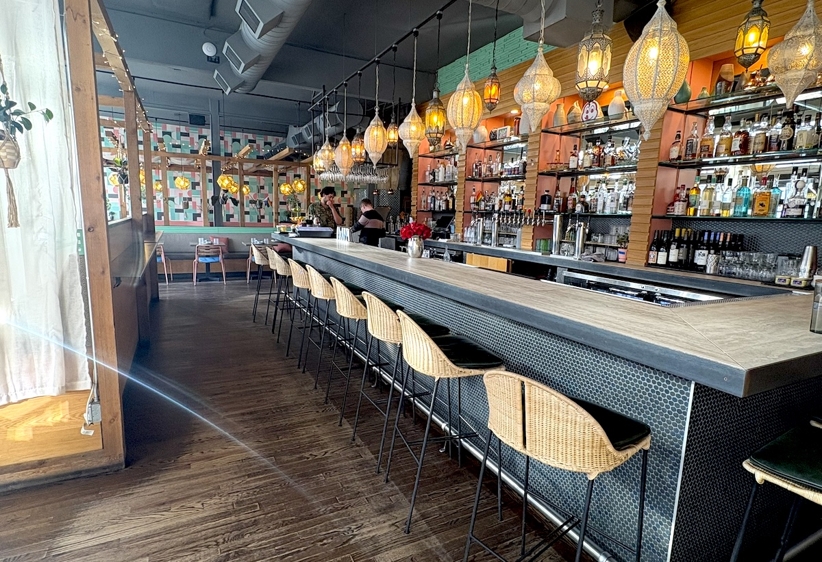 A large bar flanks one side of the restaurant. | Photo by Sara Rosenthal