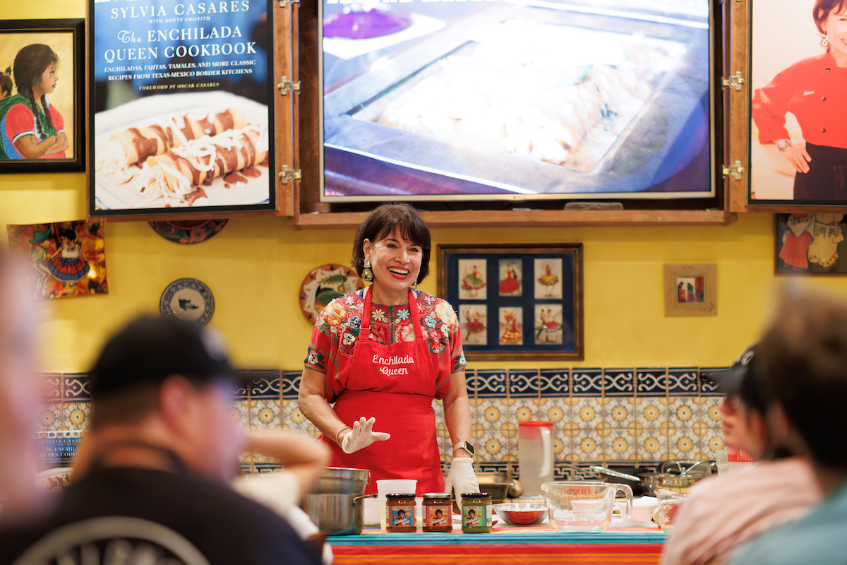 Sylvia Casares teaching a cooking class at Sylvia's Enchilada Kitchen. | Photo by Marlo Wise Photography