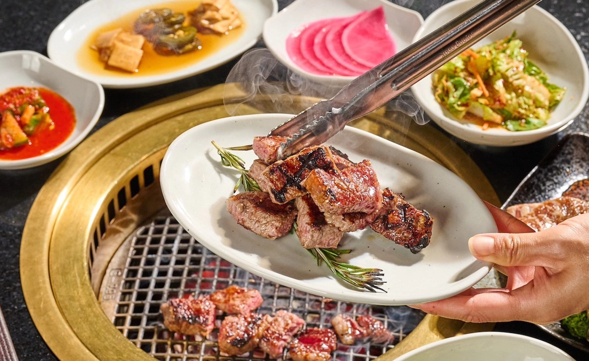 Meats grilled tableside and banchan at Bene Korean Steakhouse. | Photo by Bene Korean Steakhouse