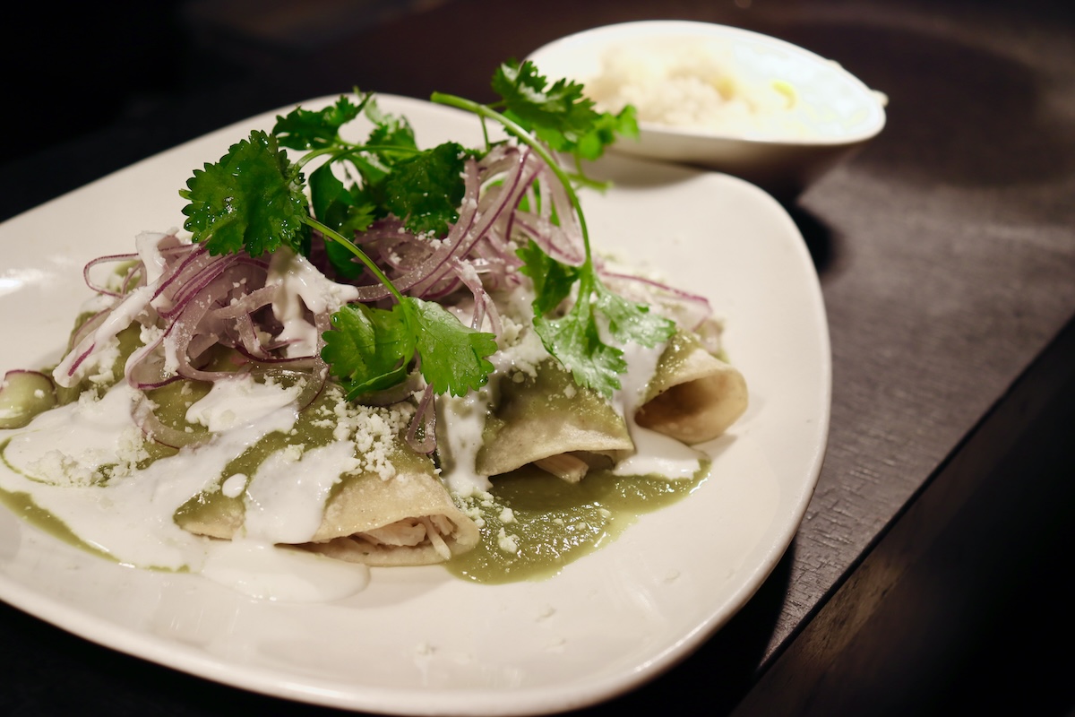 A plate of enchilada is good as bar food or for a more formal meal. | Photo by Norma Padilla