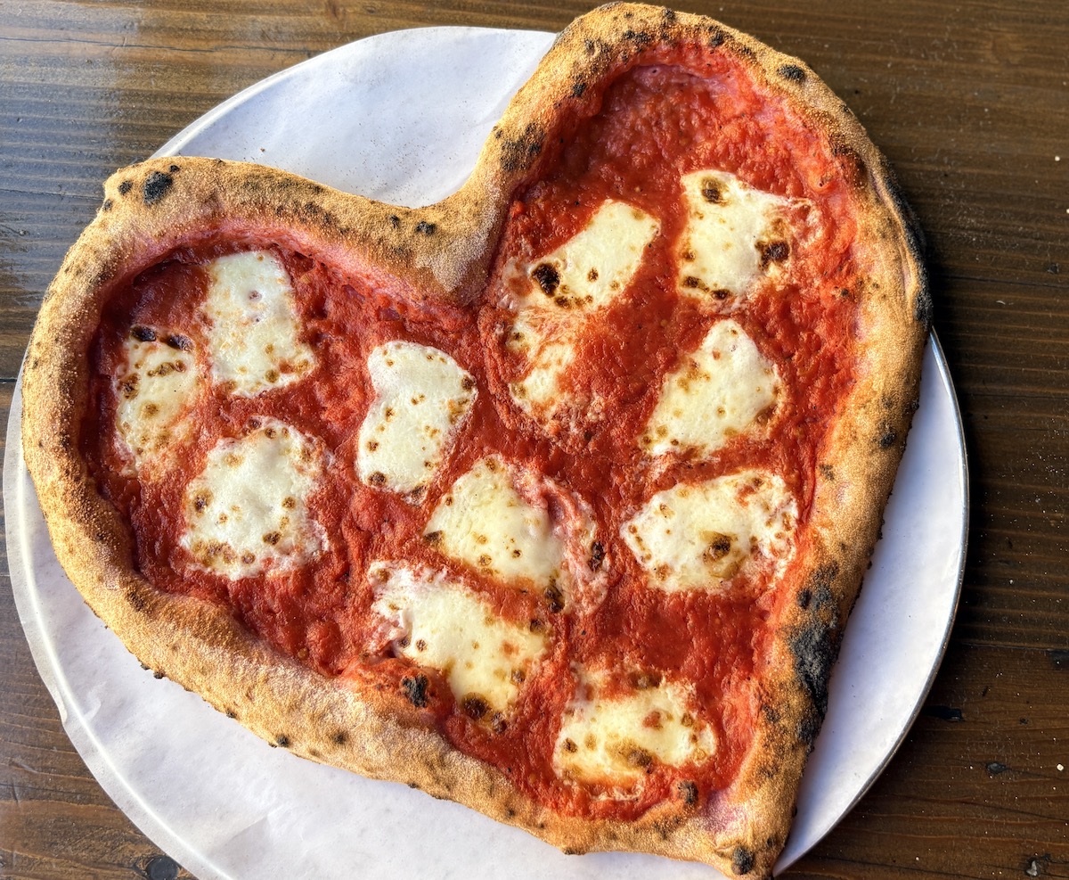 Heart-shaped pizza at Pizaro's. | Photo by Pizaro's Pizza
