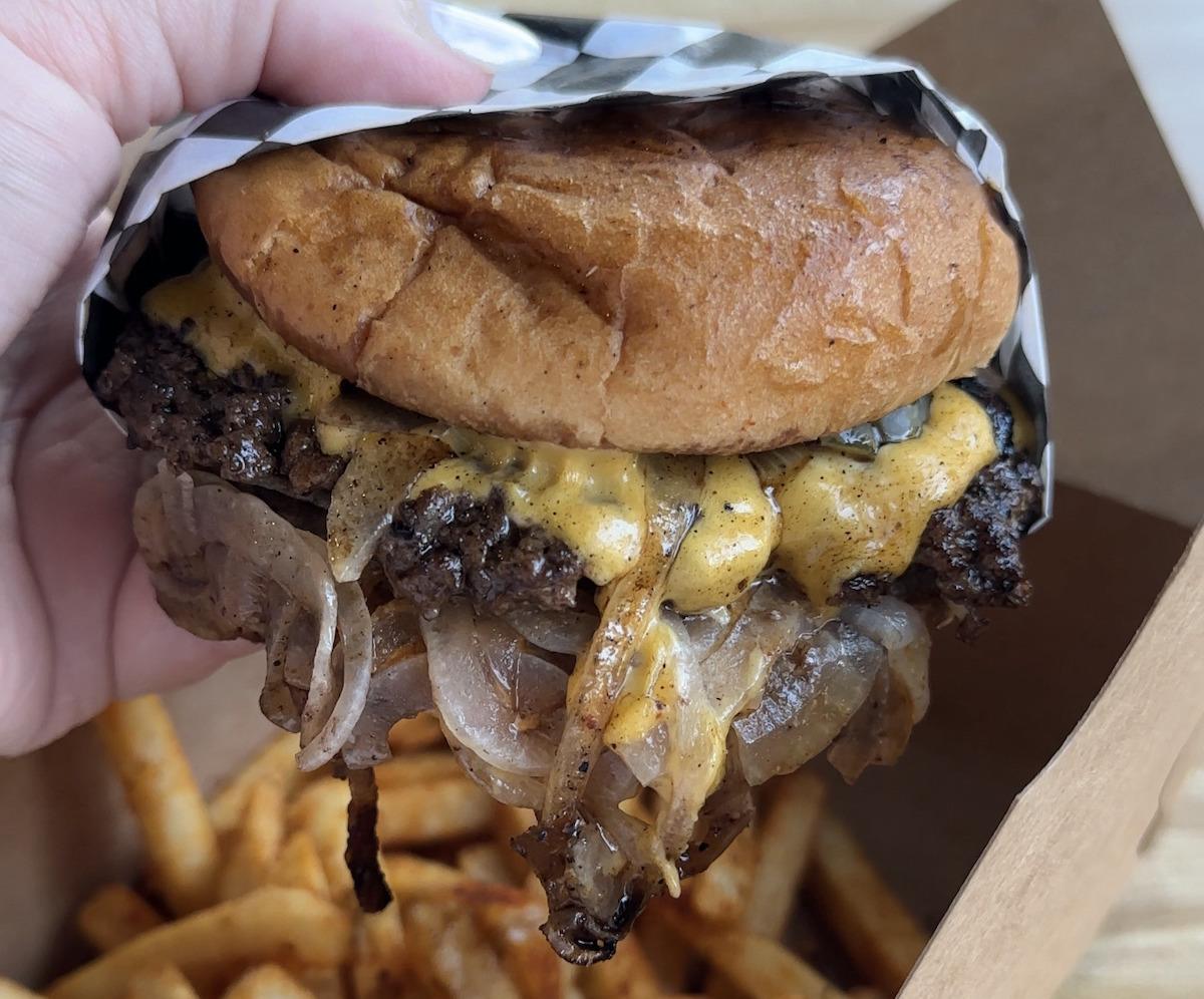 Smashburger and fries at Herby's Burgers. | Photo by Rachel Pinn