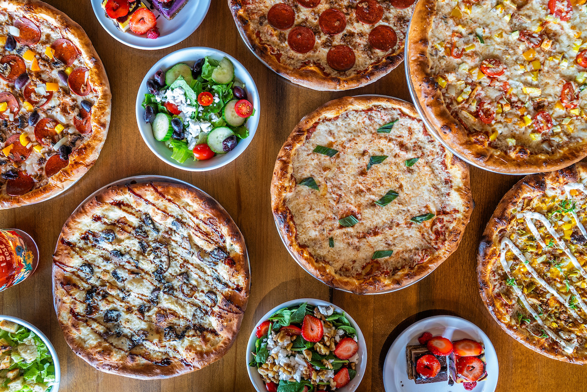 A variety of salads and pies at Pizza Verdura Sincera. | Photo by Pizza Verdura Sincera 