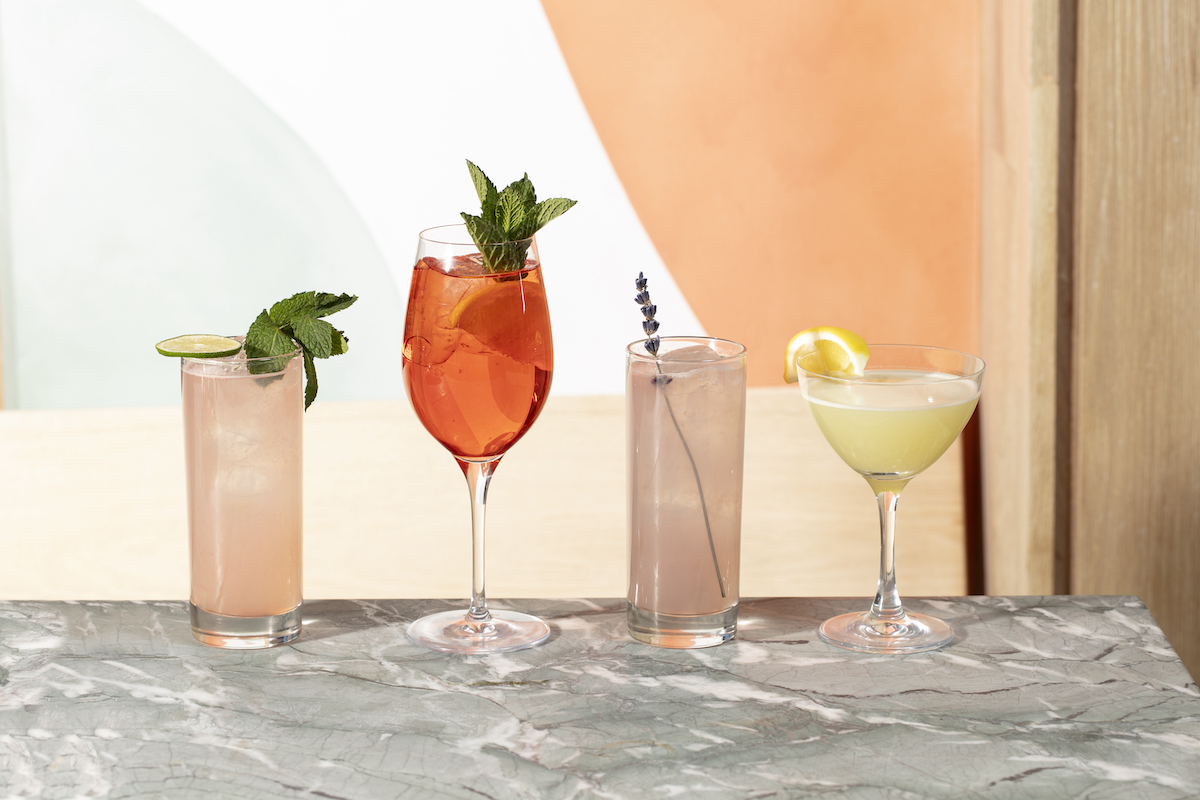 A lineup of cocktails at Little Ruby's. | Photo by Wish You Were Here Group