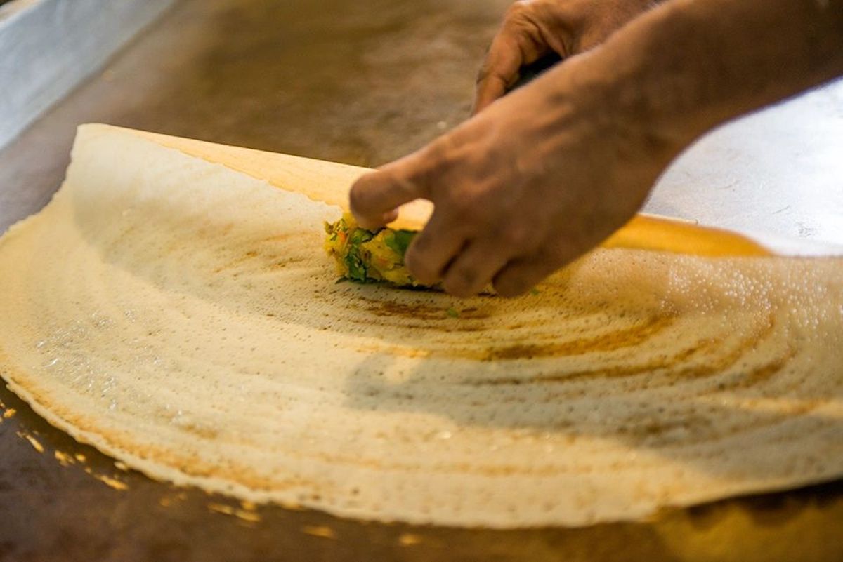 A dosa being filled at Madras Mantra. | Photo by Madras Mantra