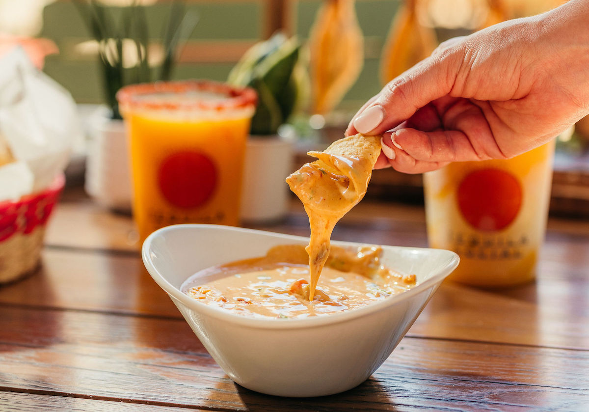 A hefty dip of queso at Tequila Social. | Photo by Harwood Hospitality Group